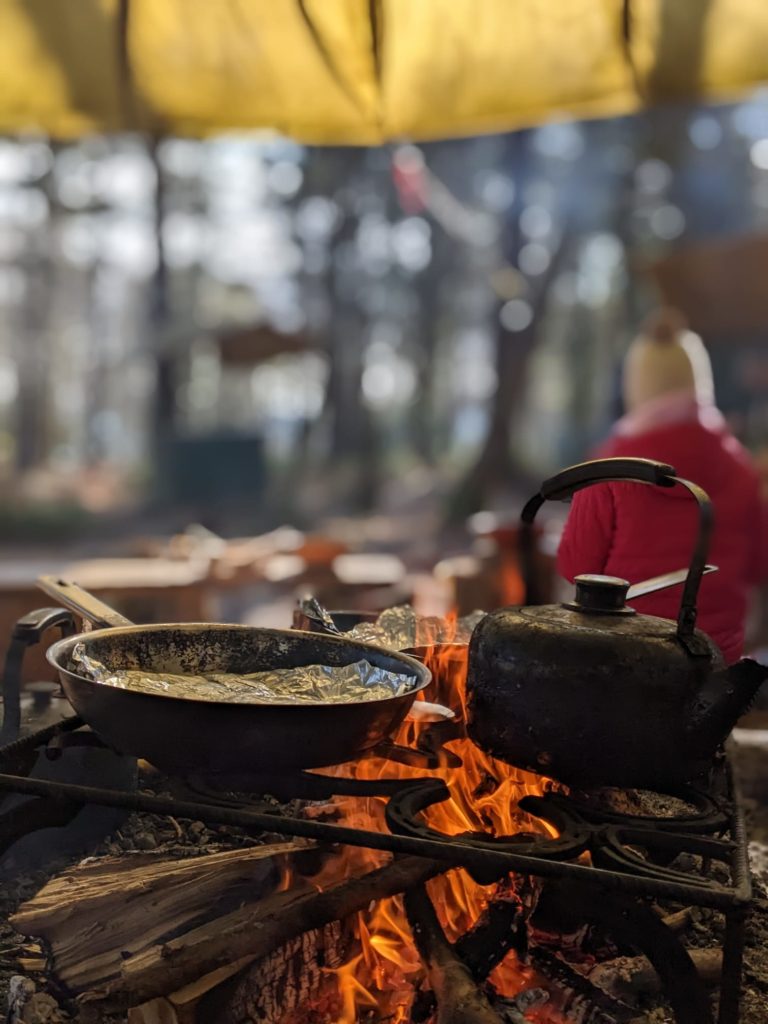 Image of the chocolate brownie cooking over a campfire.
